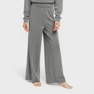 Calças compridas fluidas...